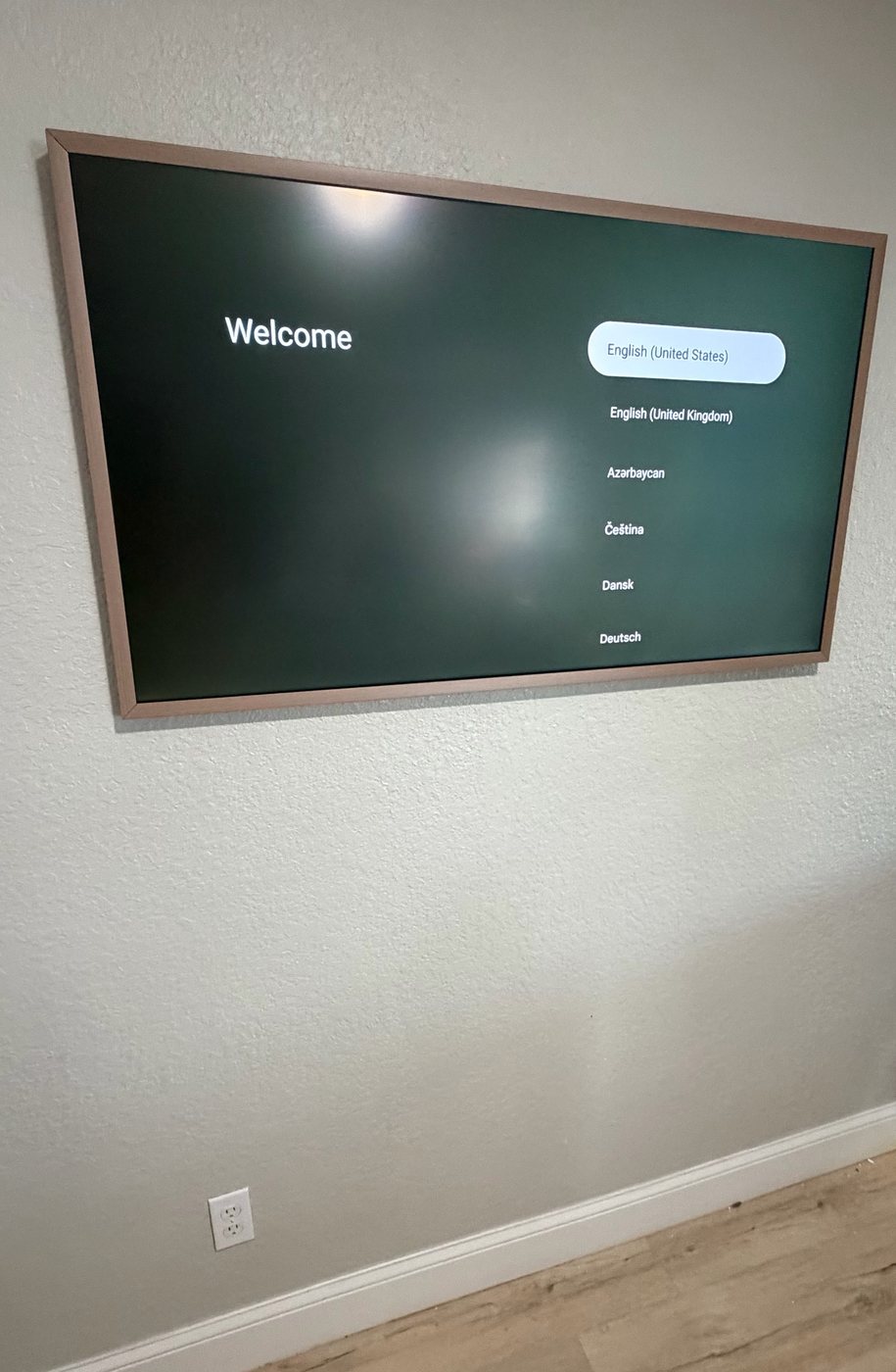 Wall-mounted TV installation